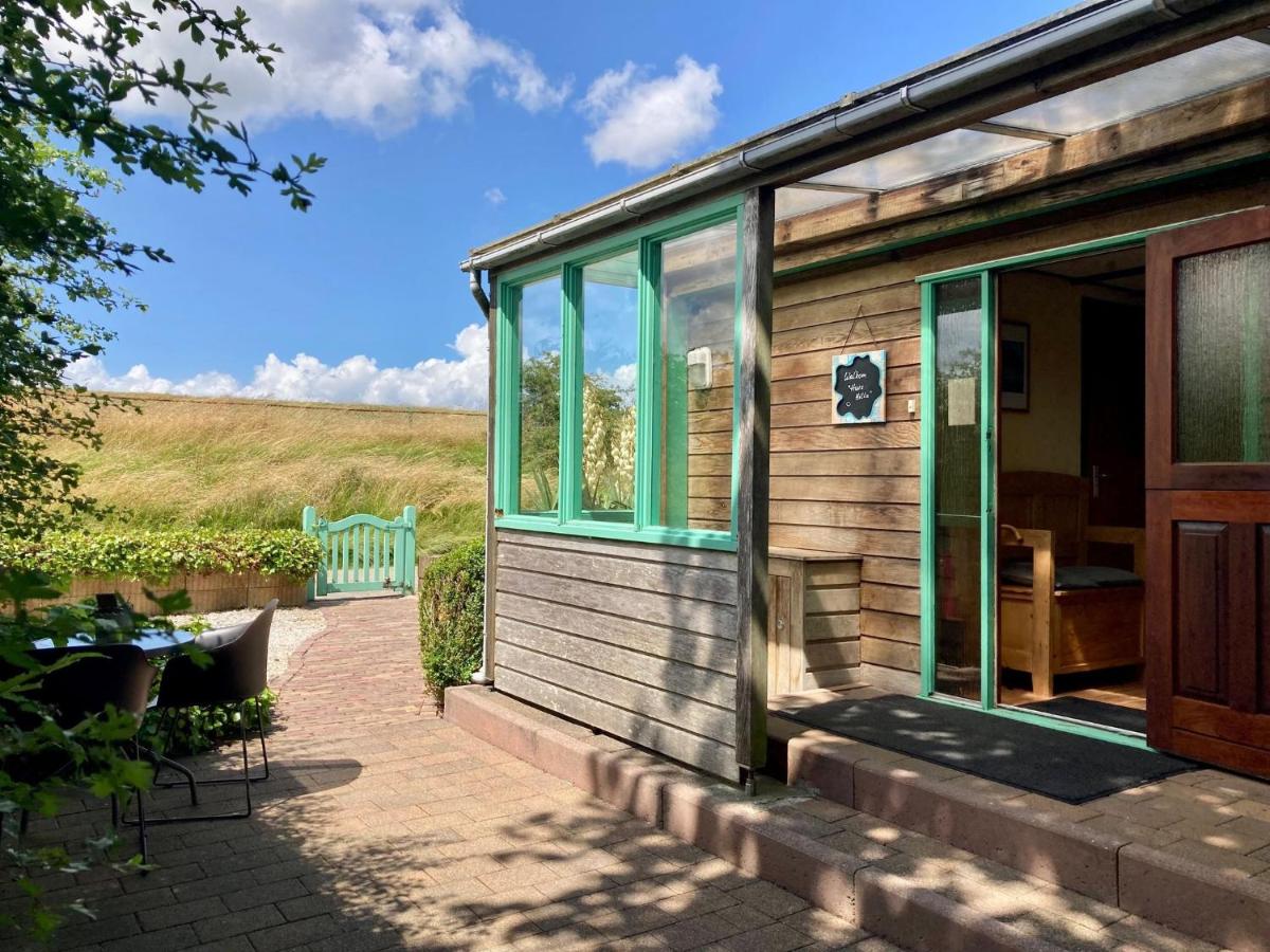 4 pers Holiday Home Hilla with winter garden in front of the dike directly on the Lauwersmeer - Housity