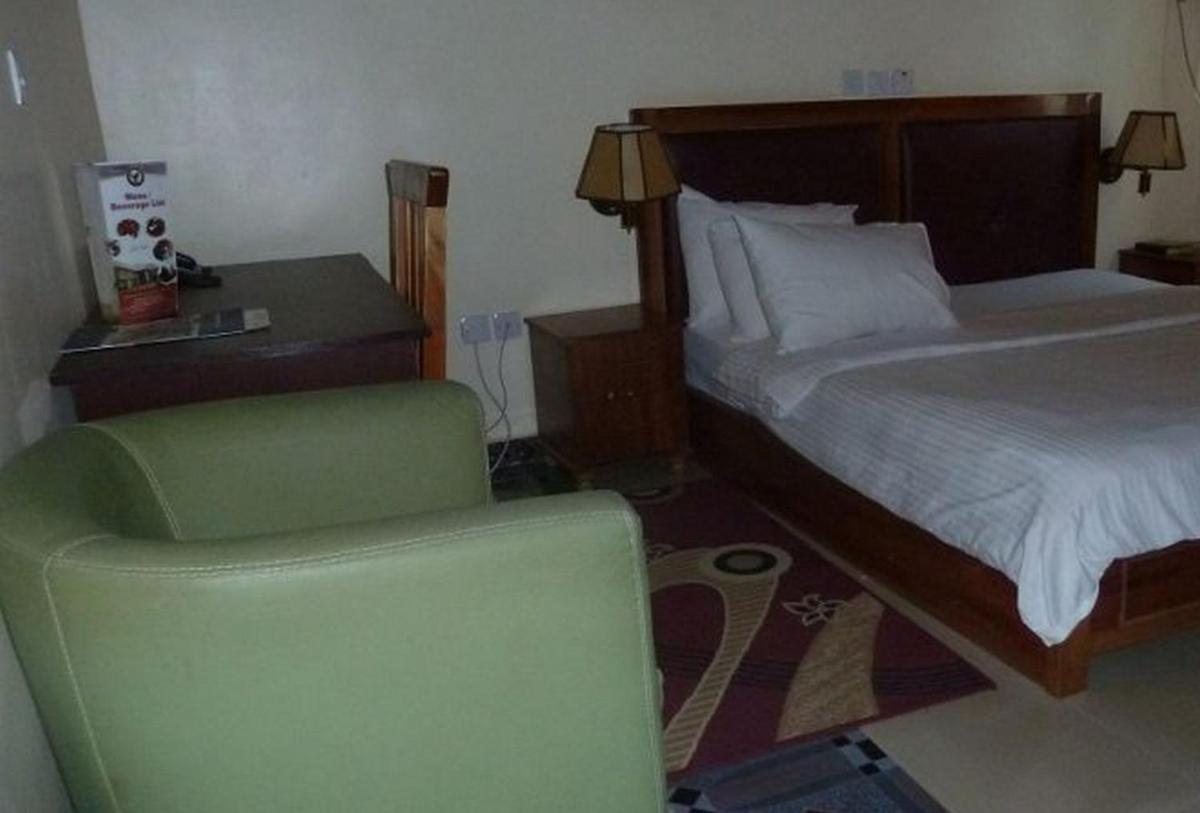 Room in Lodge - Definite Destiny Hotel - Housity