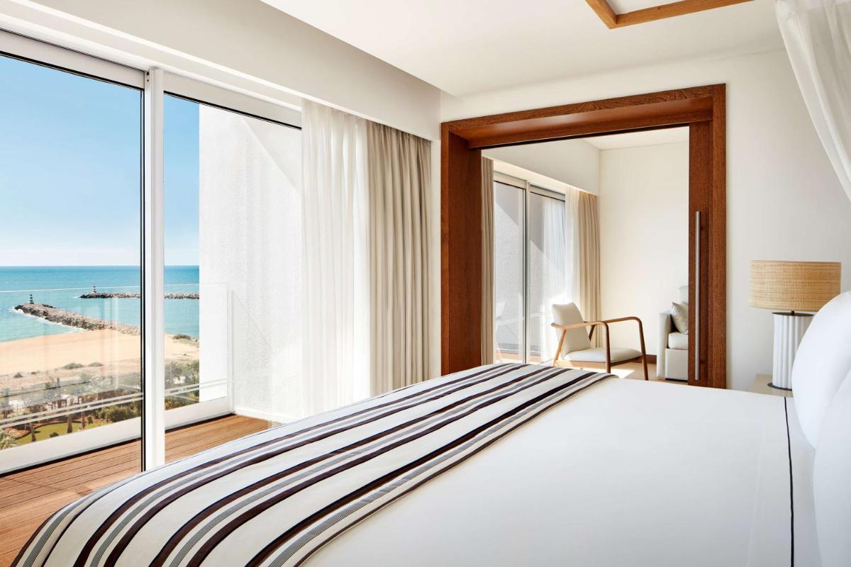 Uma cama ou camas num quarto em Tivoli Marina Vilamoura