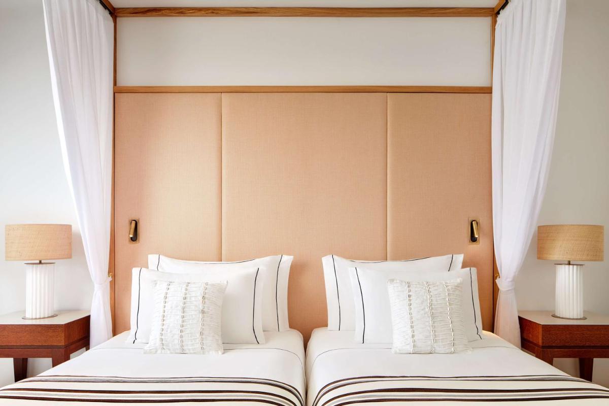 Uma cama ou camas num quarto em Tivoli Marina Vilamoura