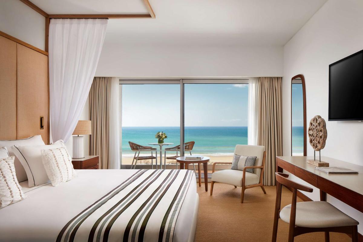 Uma cama ou camas num quarto em Tivoli Marina Vilamoura