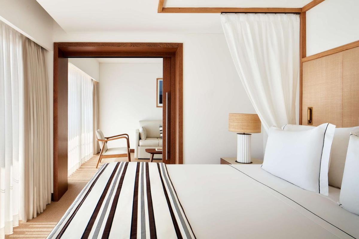 Uma cama ou camas num quarto em Tivoli Marina Vilamoura