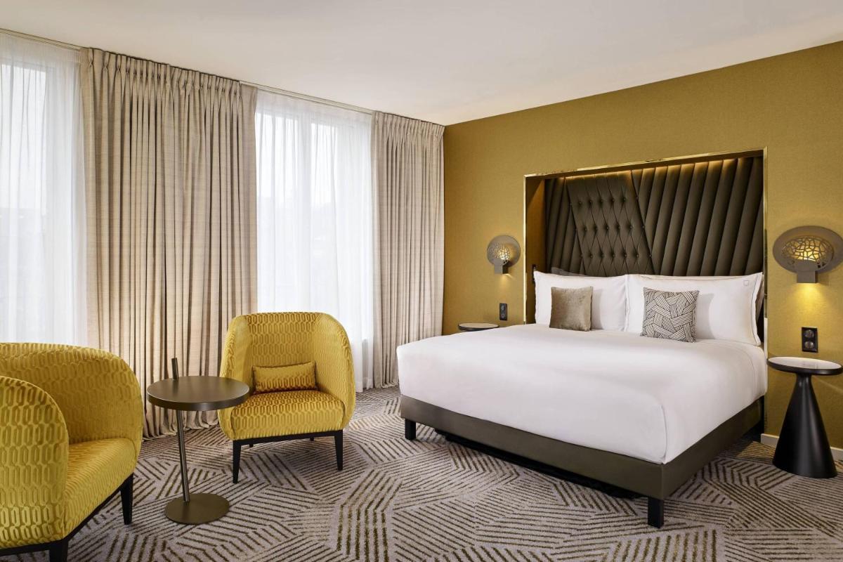 Un ou plusieurs lits dans un hébergement de l'établissement La Caserne Chanzy Hotel & Spa, Autograph Collection