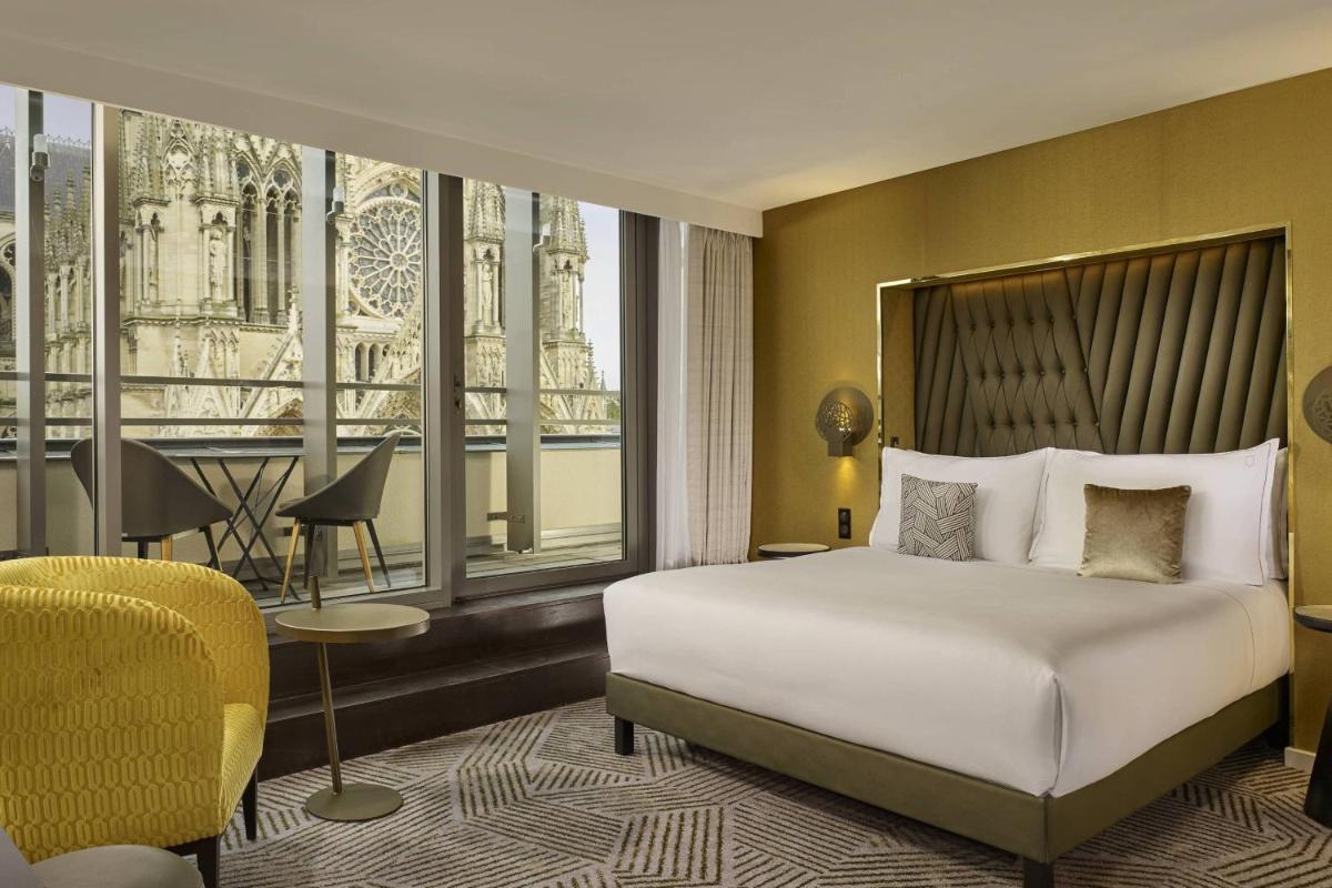Un ou plusieurs lits dans un hébergement de l'établissement La Caserne Chanzy Hotel & Spa, Autograph Collection
