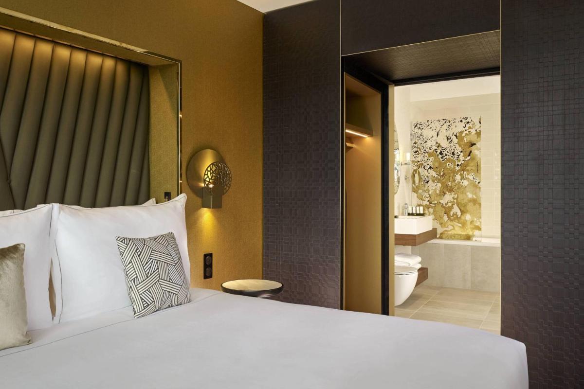 Un ou plusieurs lits dans un hébergement de l'établissement La Caserne Chanzy Hotel & Spa, Autograph Collection