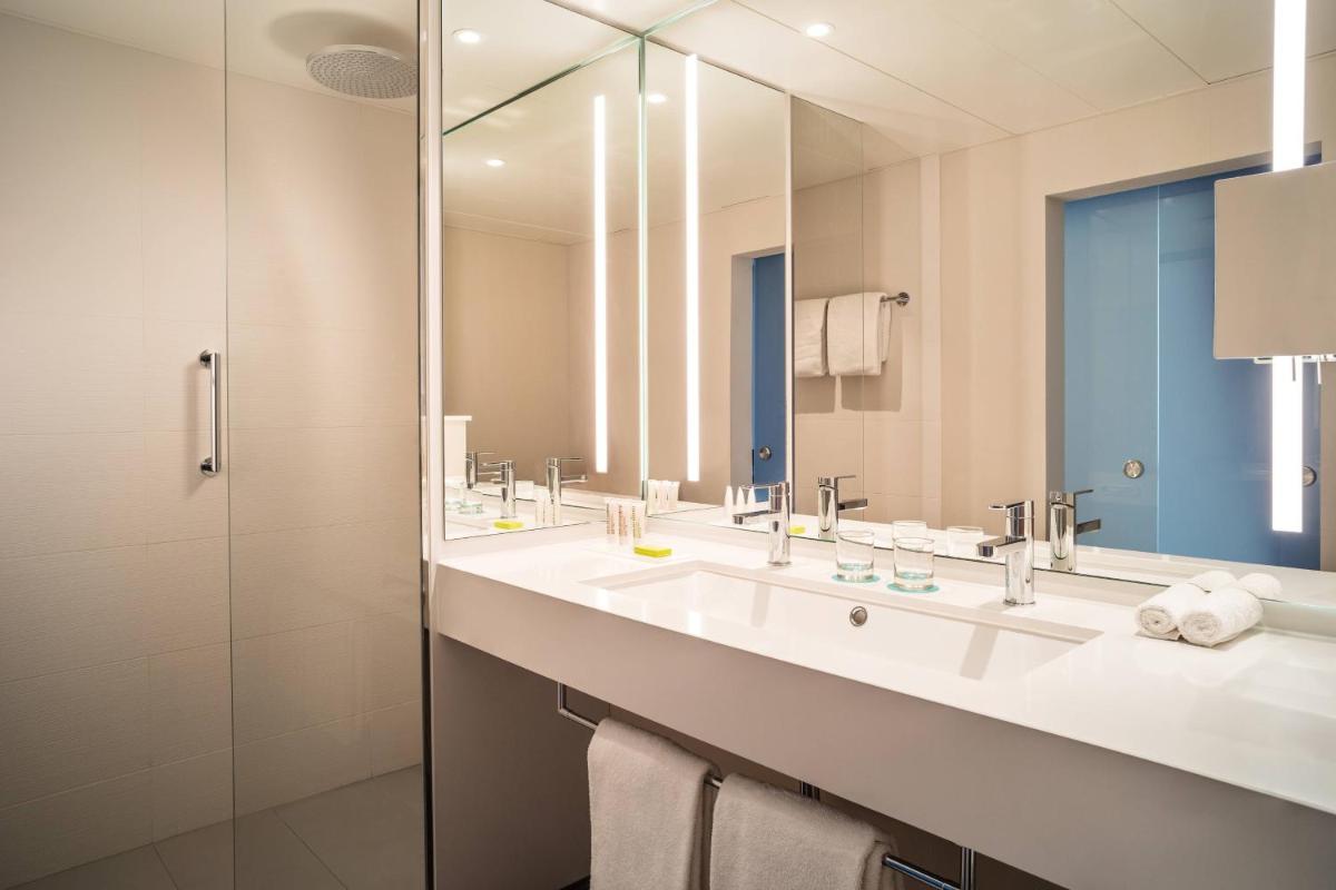 Ein Badezimmer in der Unterkunft Le Méridien Frankfurt Ein Badezimmer in der Unterkunft Le Méridien Frankfurt