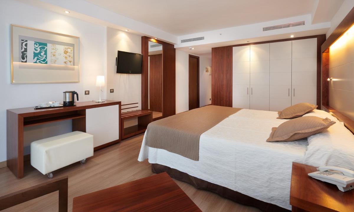 Cama o camas de una habitación en Hipotels Cala Millor Park