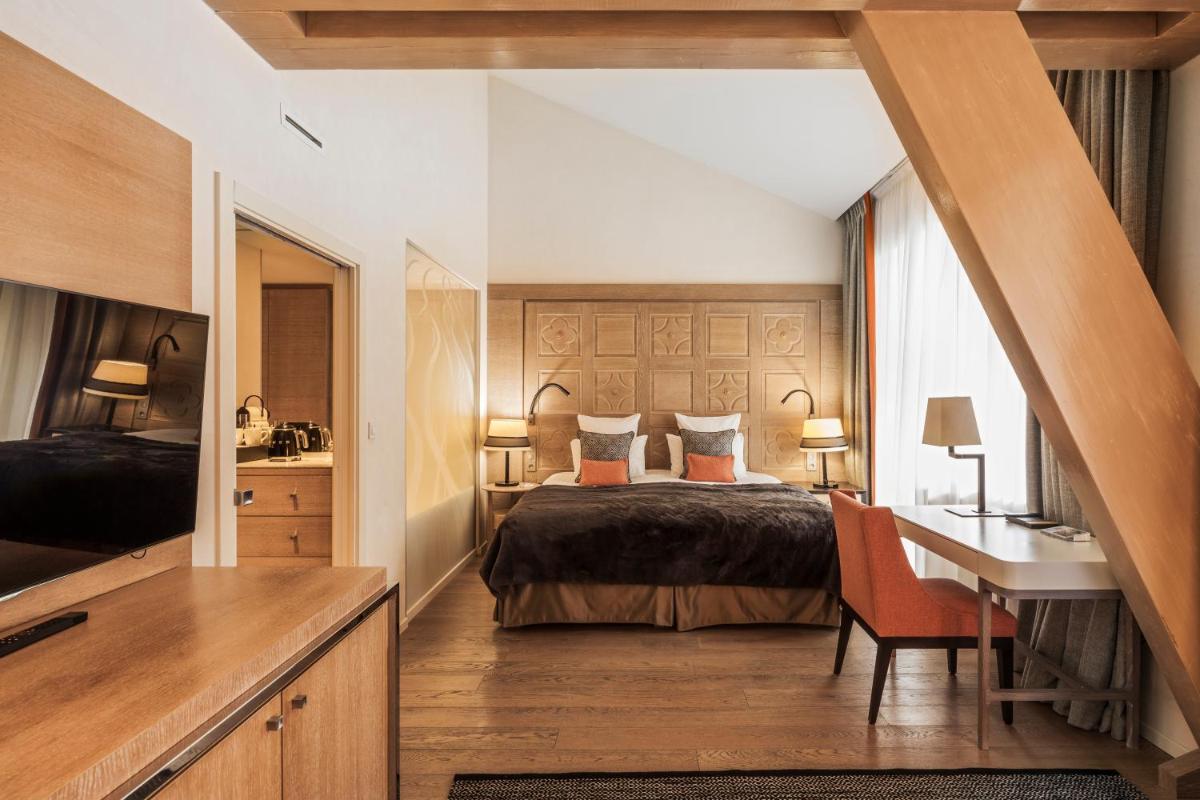 Un ou plusieurs lits dans un hébergement de l'établissement Hôtel Mont-Blanc Chamonix