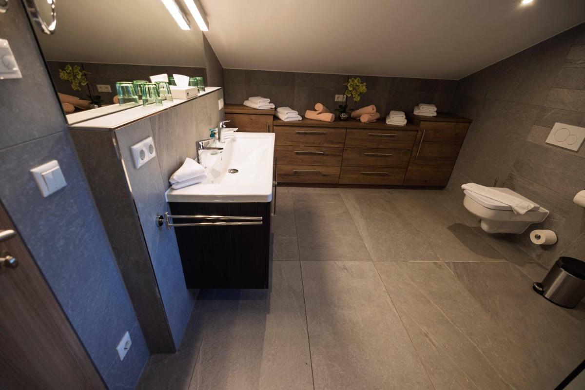 Ein Badezimmer in der Unterkunft Alpenglühn Apartments - Adult Only