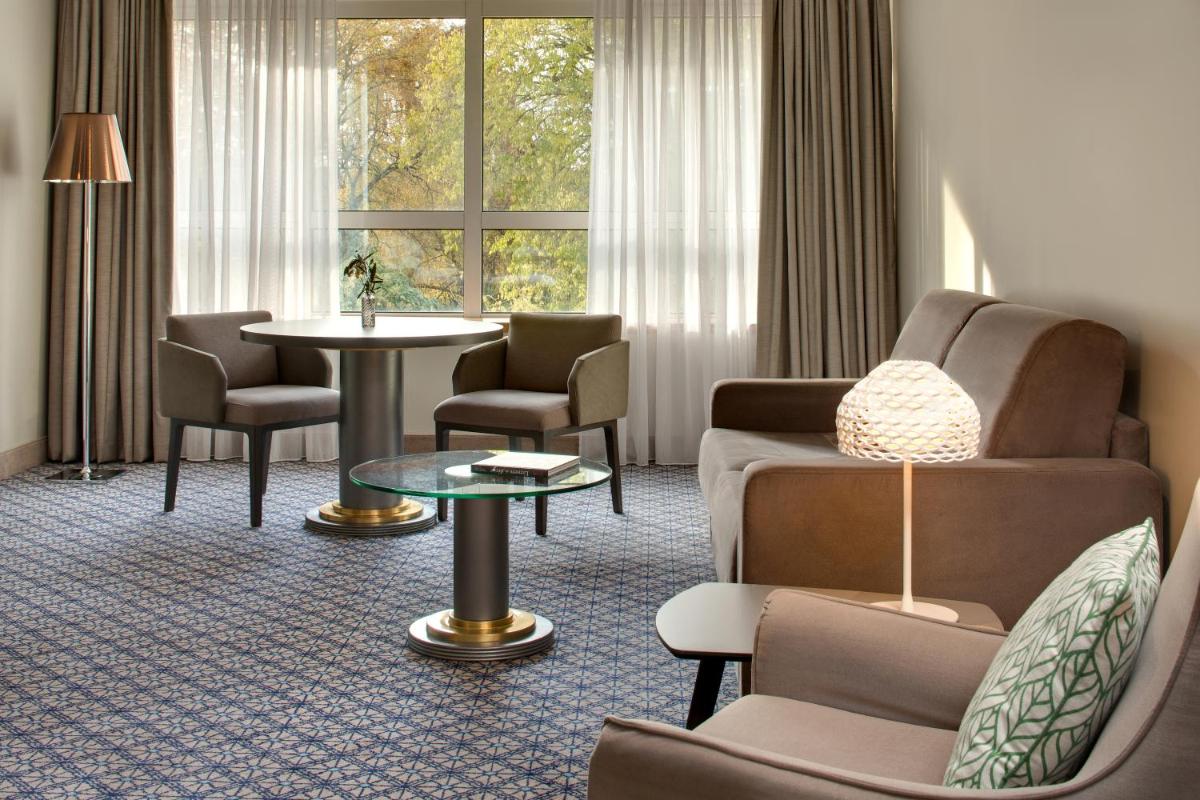 Coin salon dans l'établissement Célestins Spa Thermal & Hôtel by Vy Resort