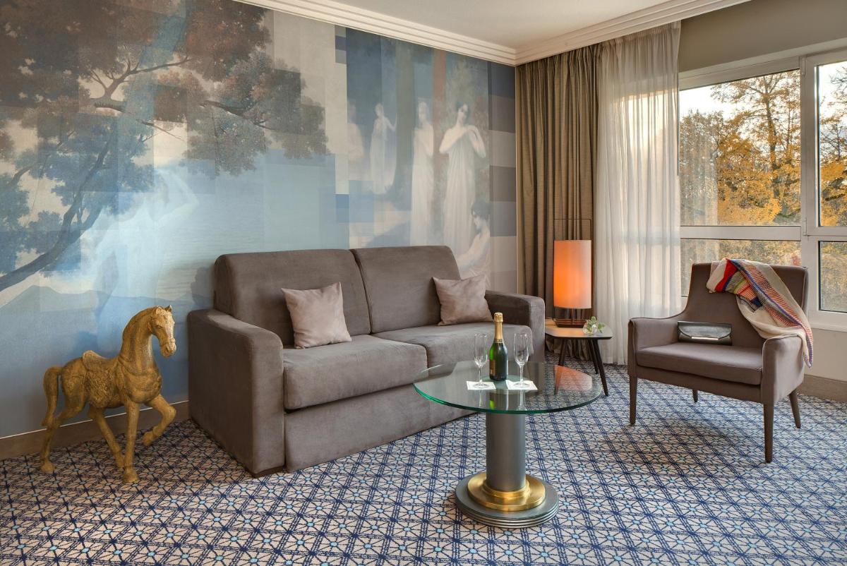 Coin salon dans l'établissement Célestins Spa Thermal & Hôtel by Vy Resort