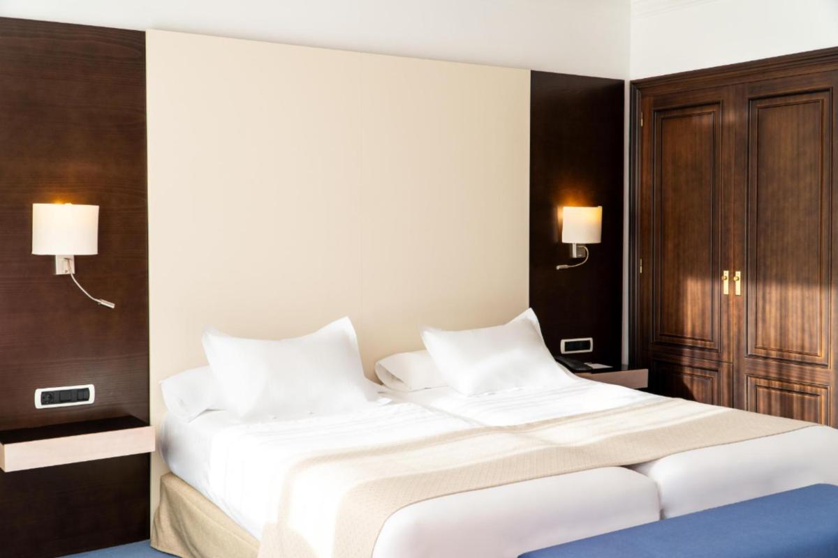 Cama o camas de una habitación en GPRO Valparaiso Palace & Spa