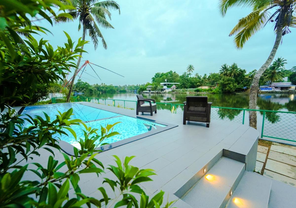 La Riva Lakeside Private Pool Villa Kochi by VOYE HOMES - Housity