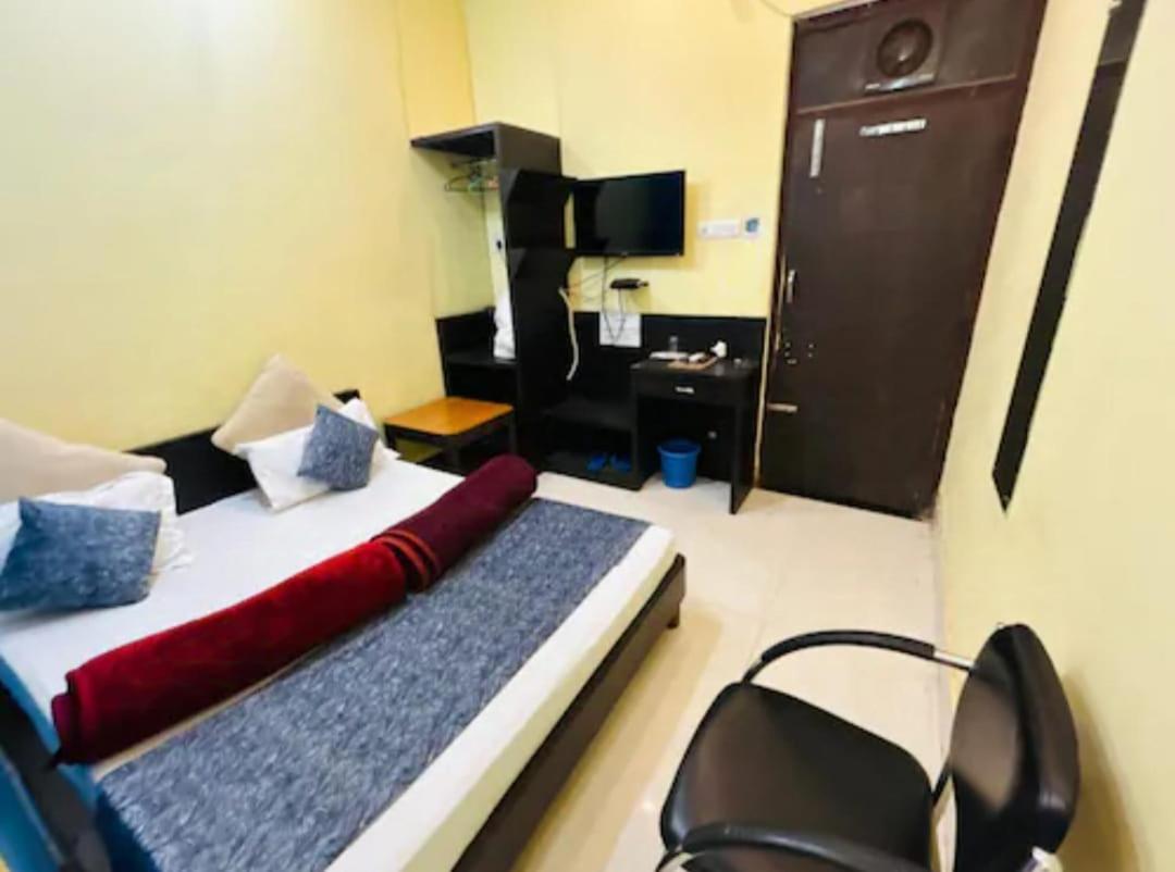 Hotel Ashoka Grand - Housity