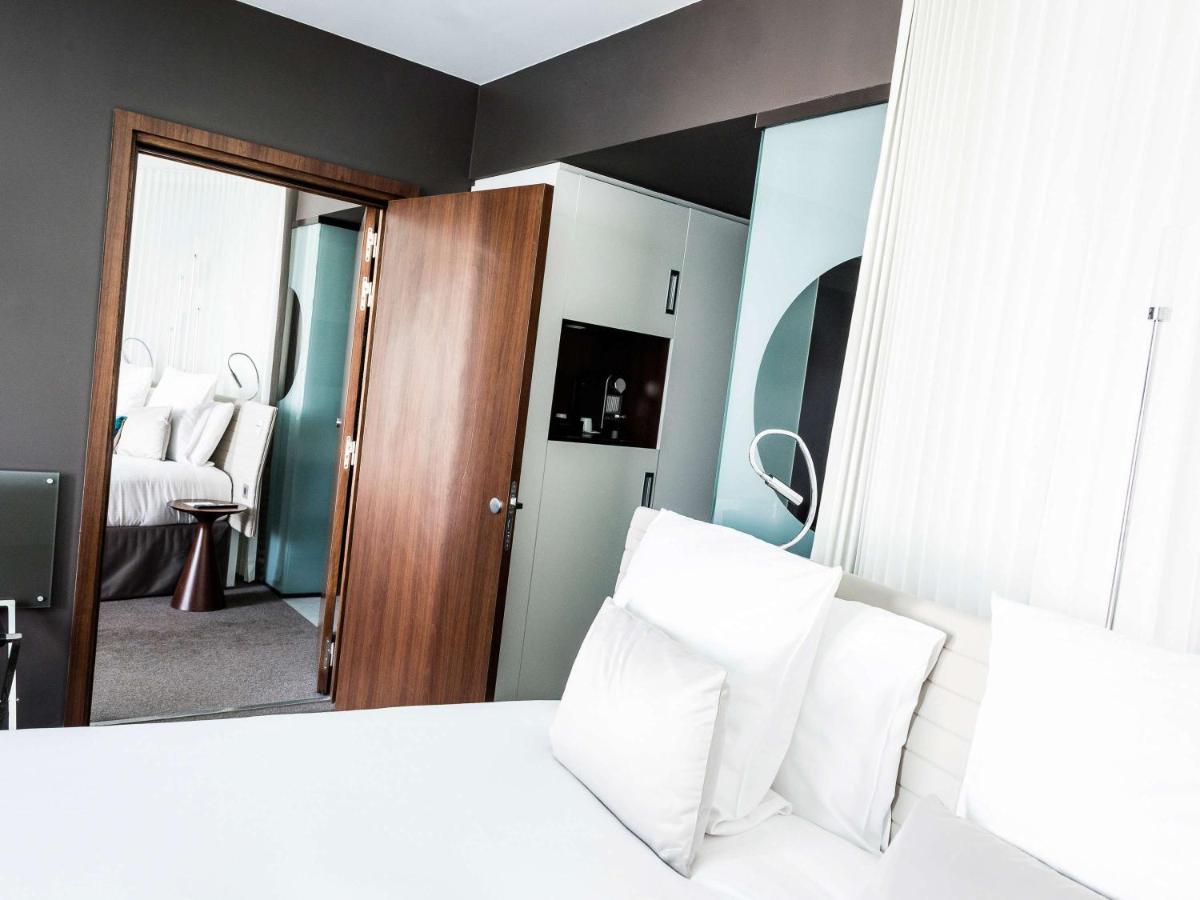 Un ou plusieurs lits dans un hébergement de l'établissement Molitor Hotel & Spa Paris - MGallery Collection
