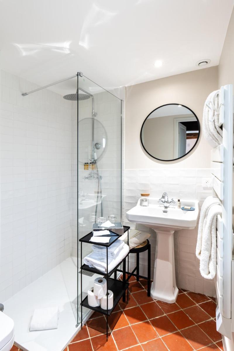 Salle de bains dans l'établissement Les Manoirs des Portes de Deauville - Small Luxury Hotel Of The World