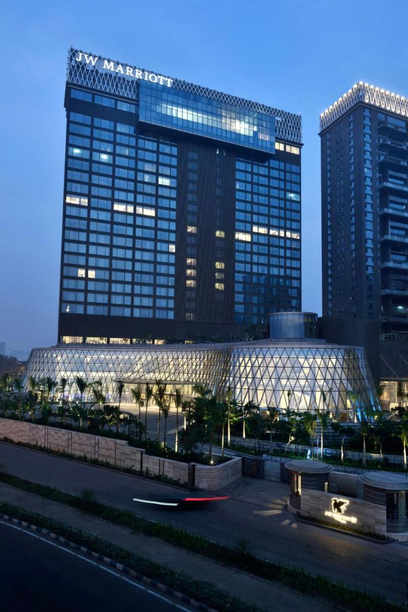 a large building with two tall buildings at JW Marriott Hotel Kolkata in Kolkata a large building with two tall buildings at JW Marriott Hotel Kolkata in Kolkata