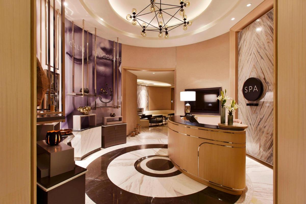 a large room with a lobby with a salon at JW Marriott Hotel Kolkata in Kolkata