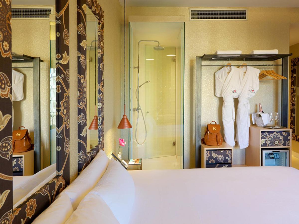 Cama o camas de una habitación en Axel Hotel Barcelona - Adults Only