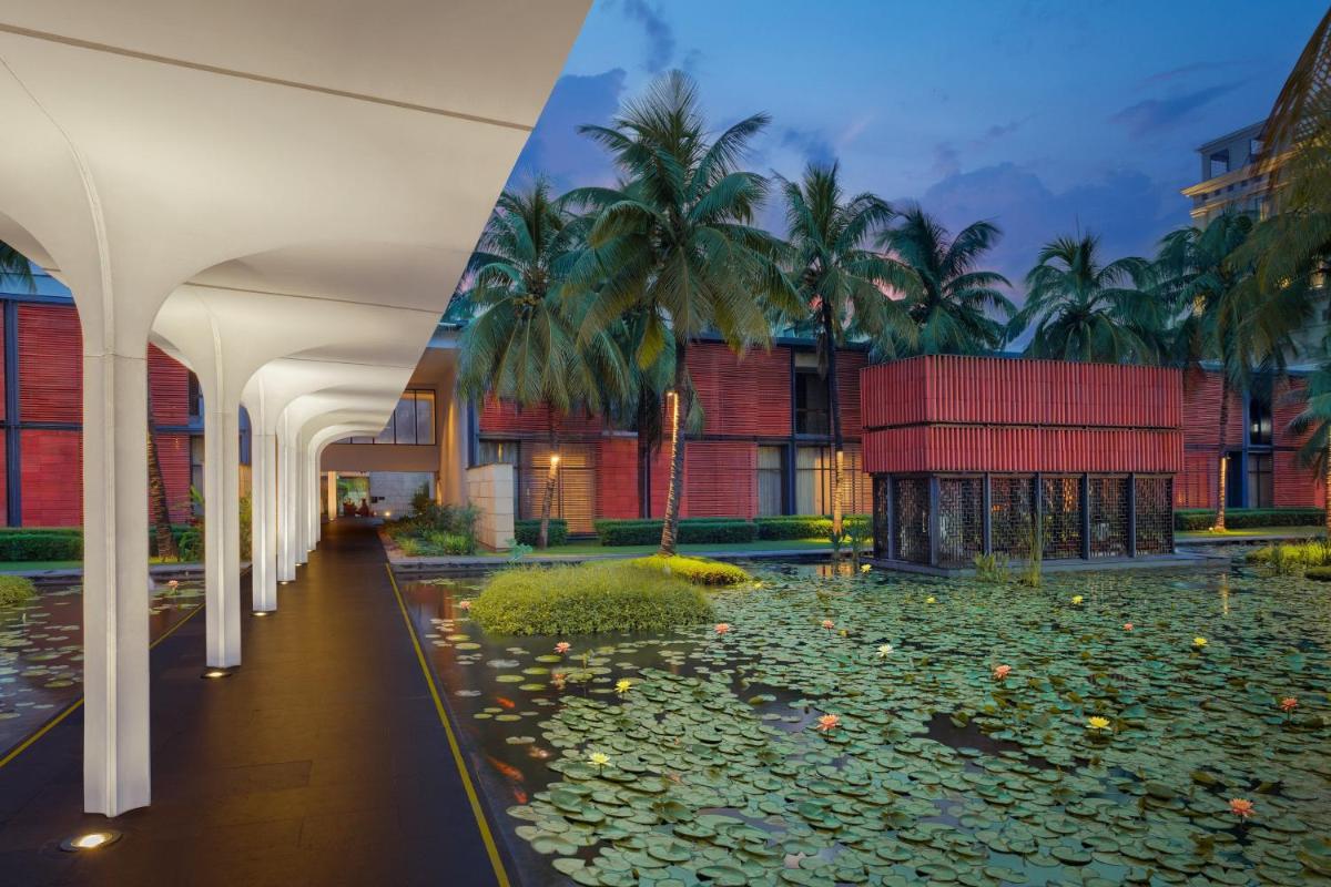 a rendering of a building with a pond and palm trees at ITC Sonar, a Luxury Collection Hotel, Kolkata in Kolkata