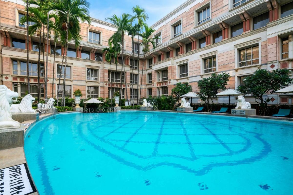 a large swimming pool in front of a building at ITC Maratha, a Luxury Collection Hotel, Mumbai in Mumbai