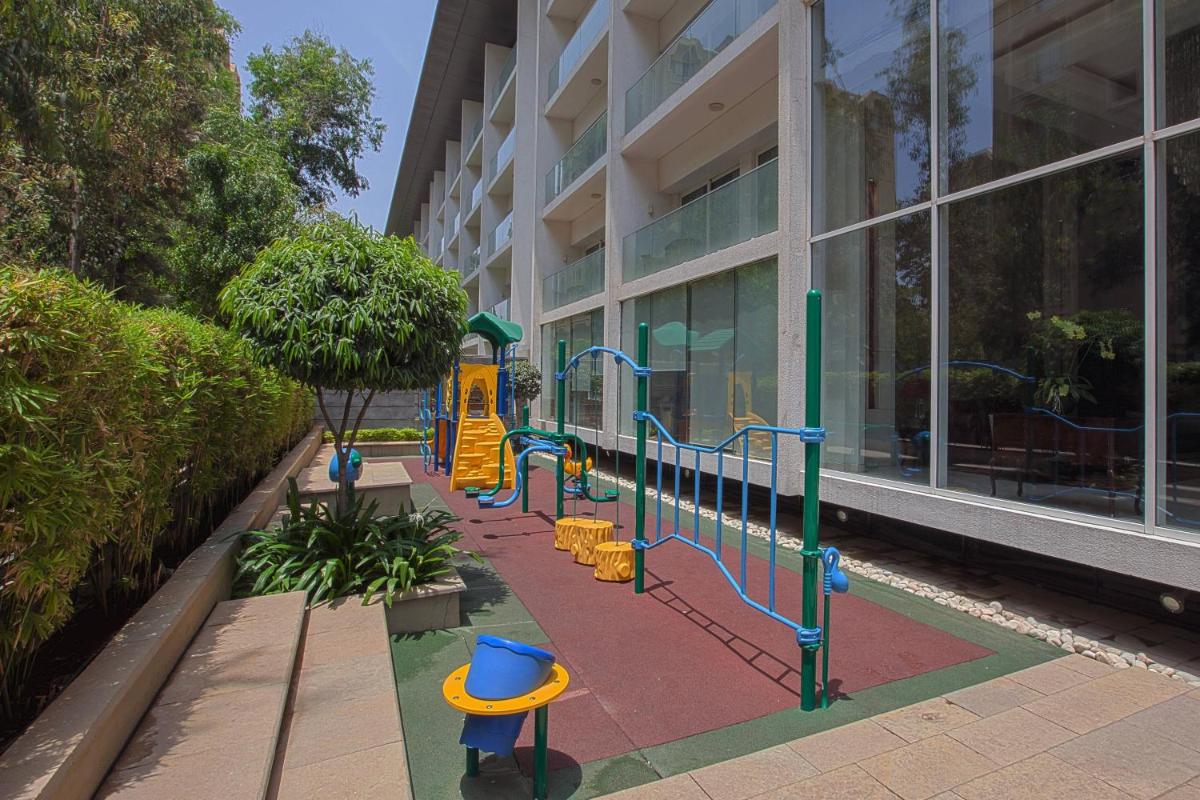 a playground in front of a building at Marriott Suites Pune in Pune