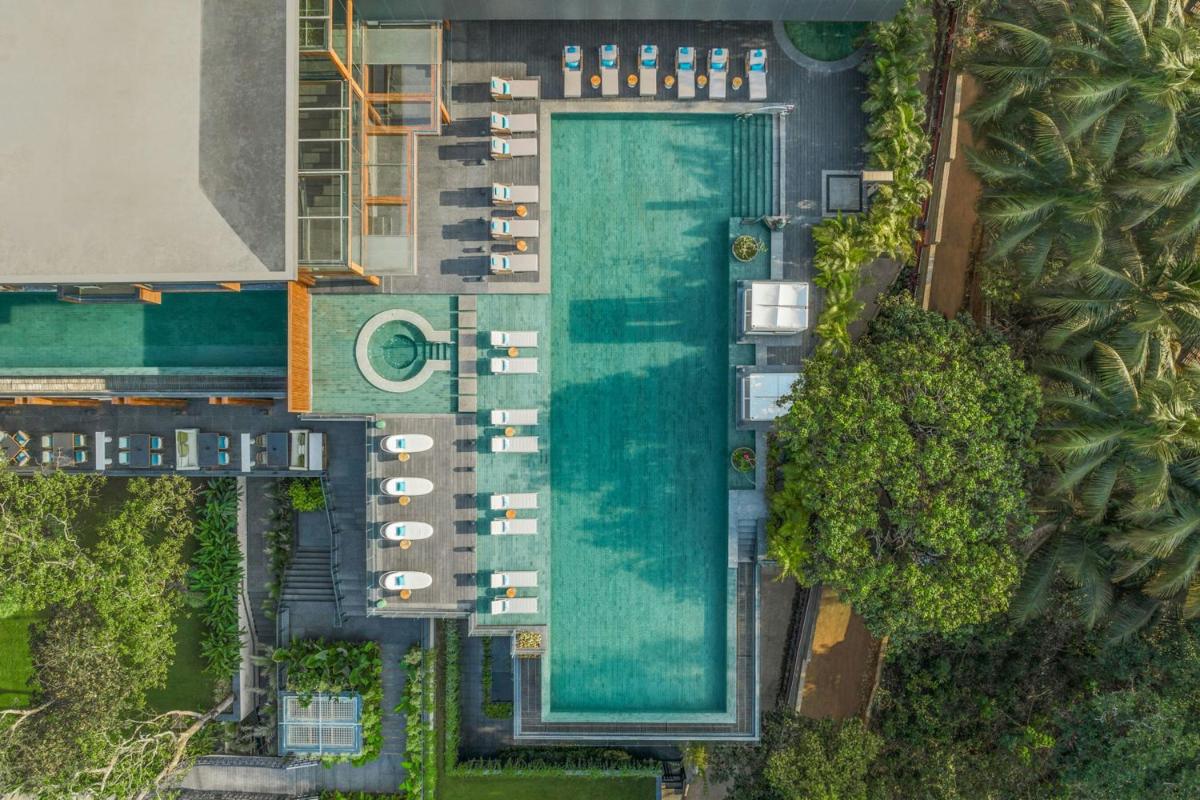 an overhead view of a pool at a resort at JW Marriott Goa in Vagator an overhead view of a pool at a resort at JW Marriott Goa in Vagator
