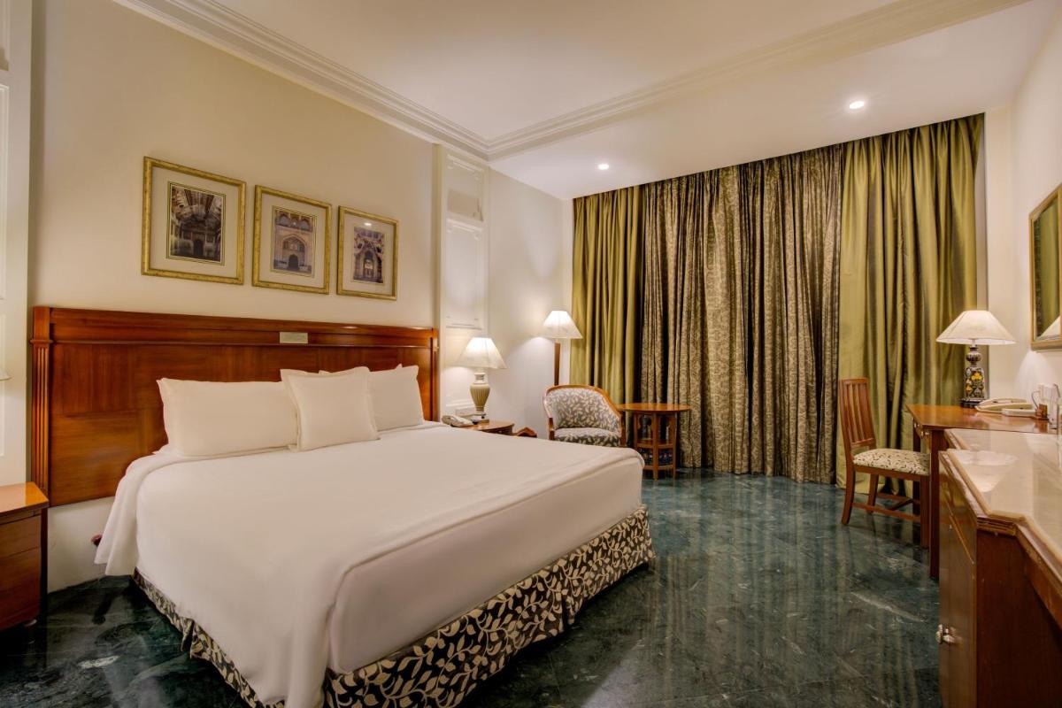 a hotel room with a bed and a desk at ITC Rajputana, a Luxury Collection Hotel, Jaipur in Jaipur