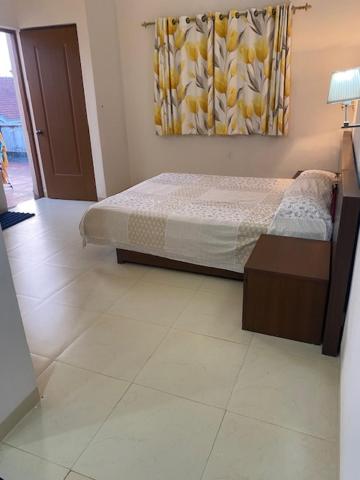Pool and Garden Facing Apartment in Riviera Foothills Near Baga, Arpora - Housity