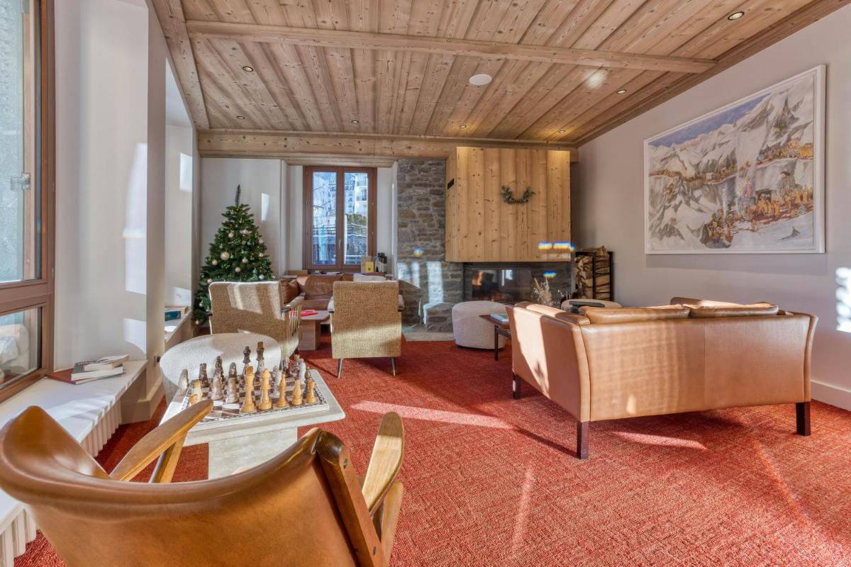 Coin salon dans l'établissement Hôtel Lyret