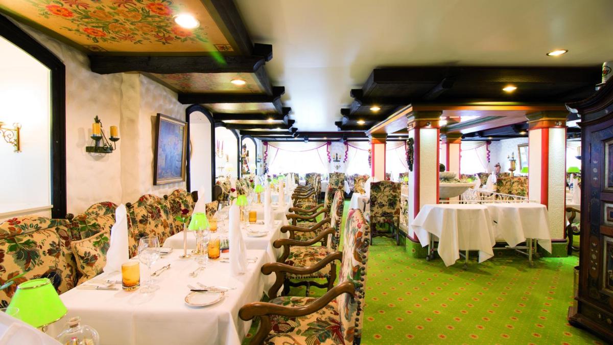 Ein Restaurant oder anderes Speiselokal in der Unterkunft Hotel Strandperle