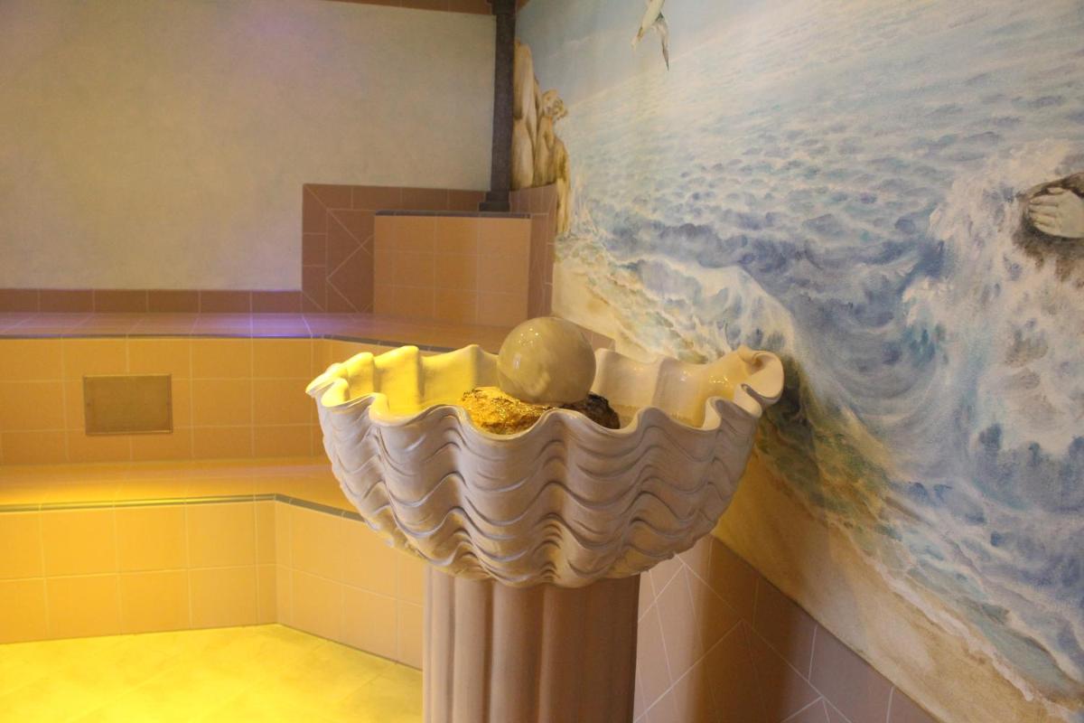 Ein Badezimmer in der Unterkunft Hotel Strandperle