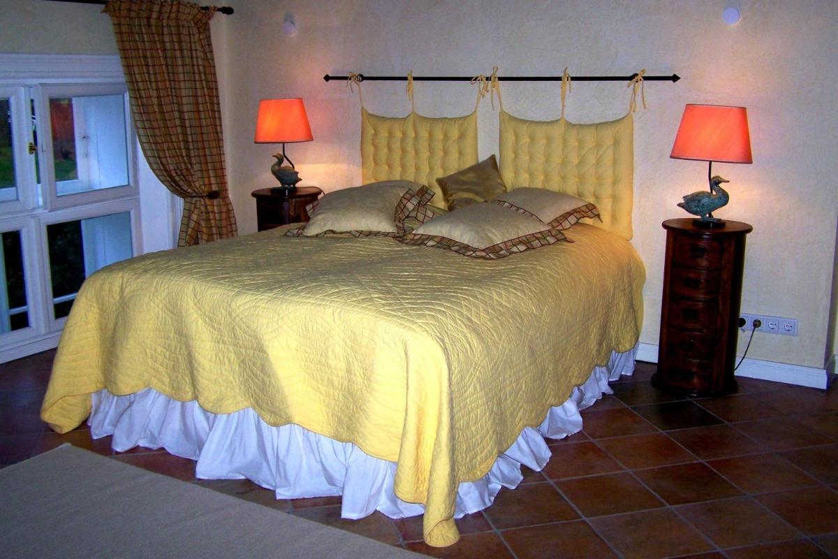 Ein Bett oder Betten in einem Zimmer der Unterkunft Herrenhaus Borghorst