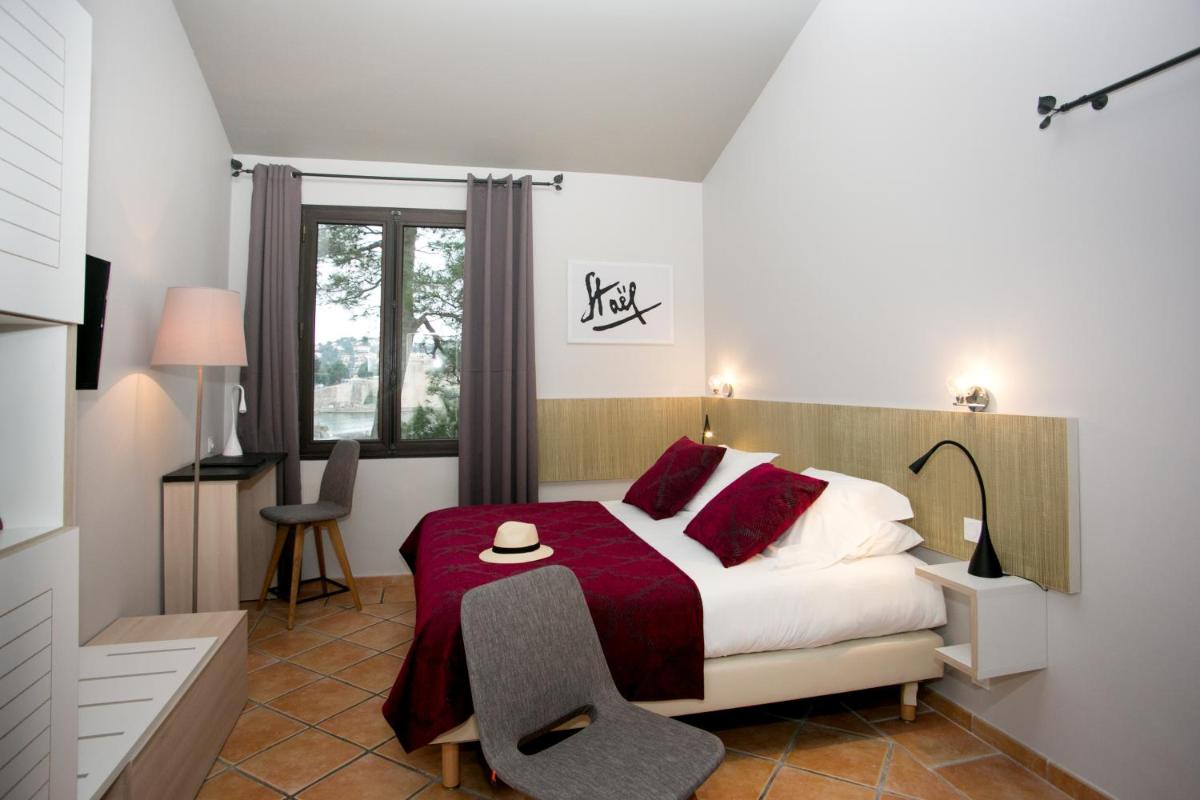 Un ou plusieurs lits dans un hébergement de l'établissement Le Relais Des Trois Mas