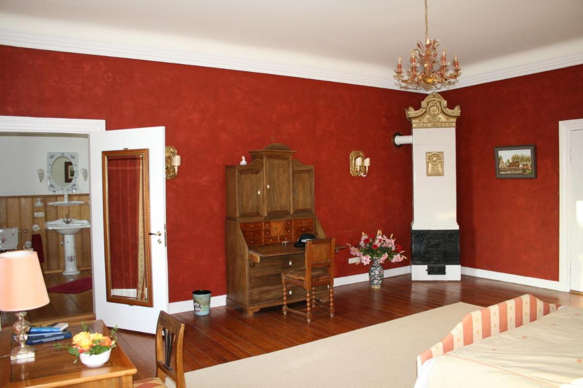 Ein Bett oder Betten in einem Zimmer der Unterkunft Herrenhaus Borghorst