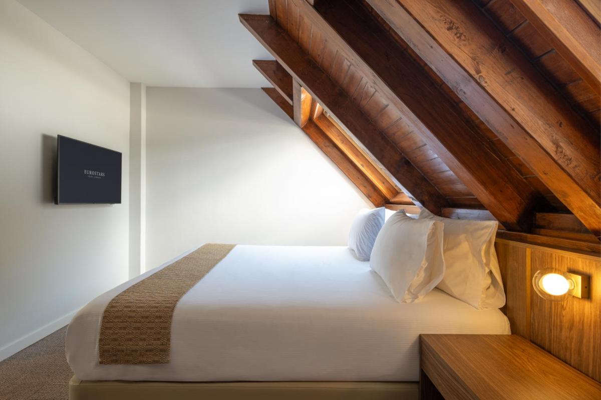 Cama o camas de una habitación en Eurostars La Pleta