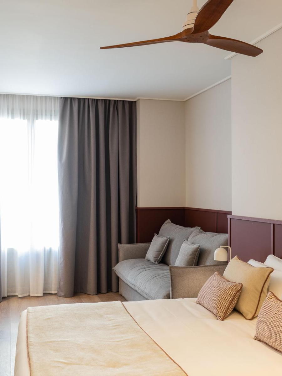Cama o camas de una habitación en Hotel Well and Come Málaga