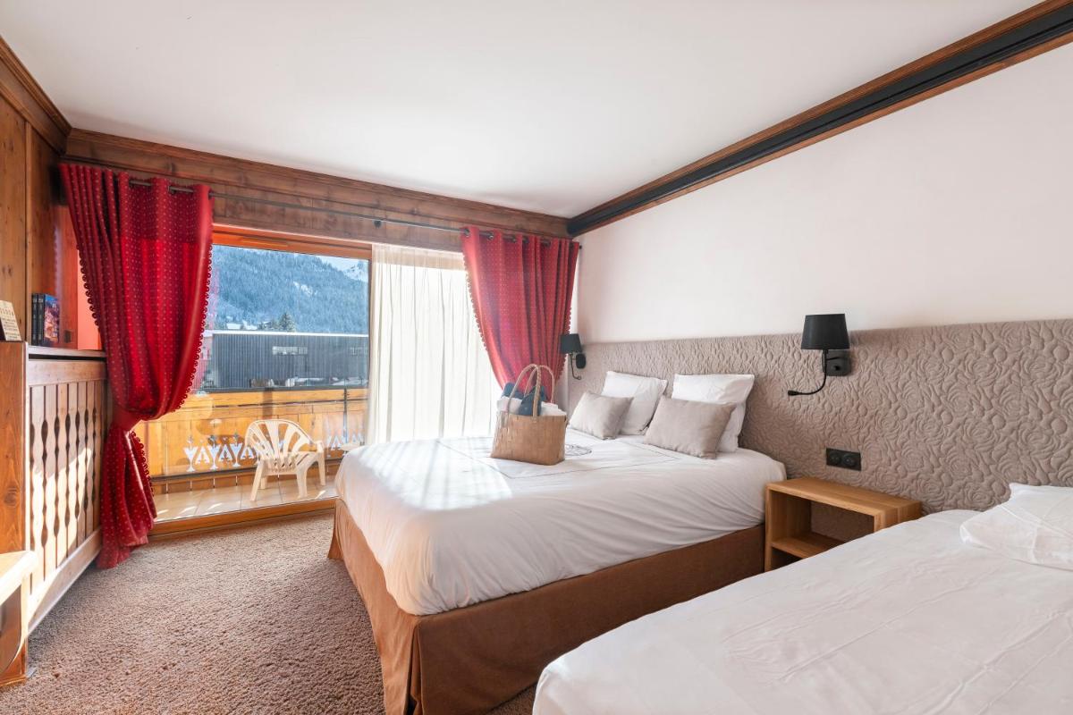 Un ou plusieurs lits dans un hébergement de l'établissement Hôtel Macchi Restaurant & Spa