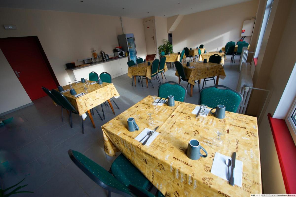 Restaurant ou autre lieu de restauration dans l'établissement Hôtel La Tente Verte
