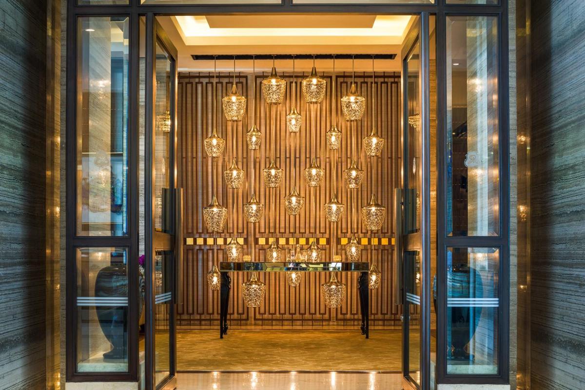 an entrance to a store with a glass door at The St. Regis Mumbai in Mumbai