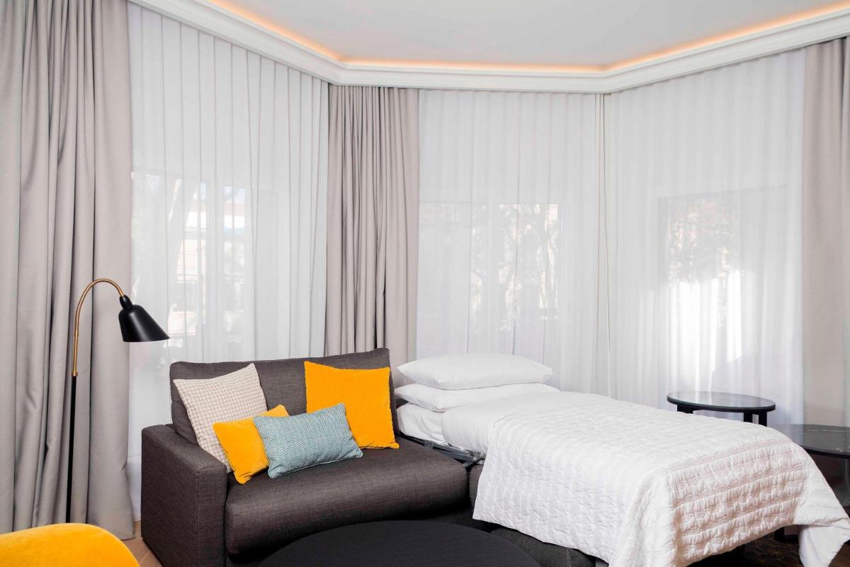 Cama o camas de una habitación en Le Meridien Barcelona