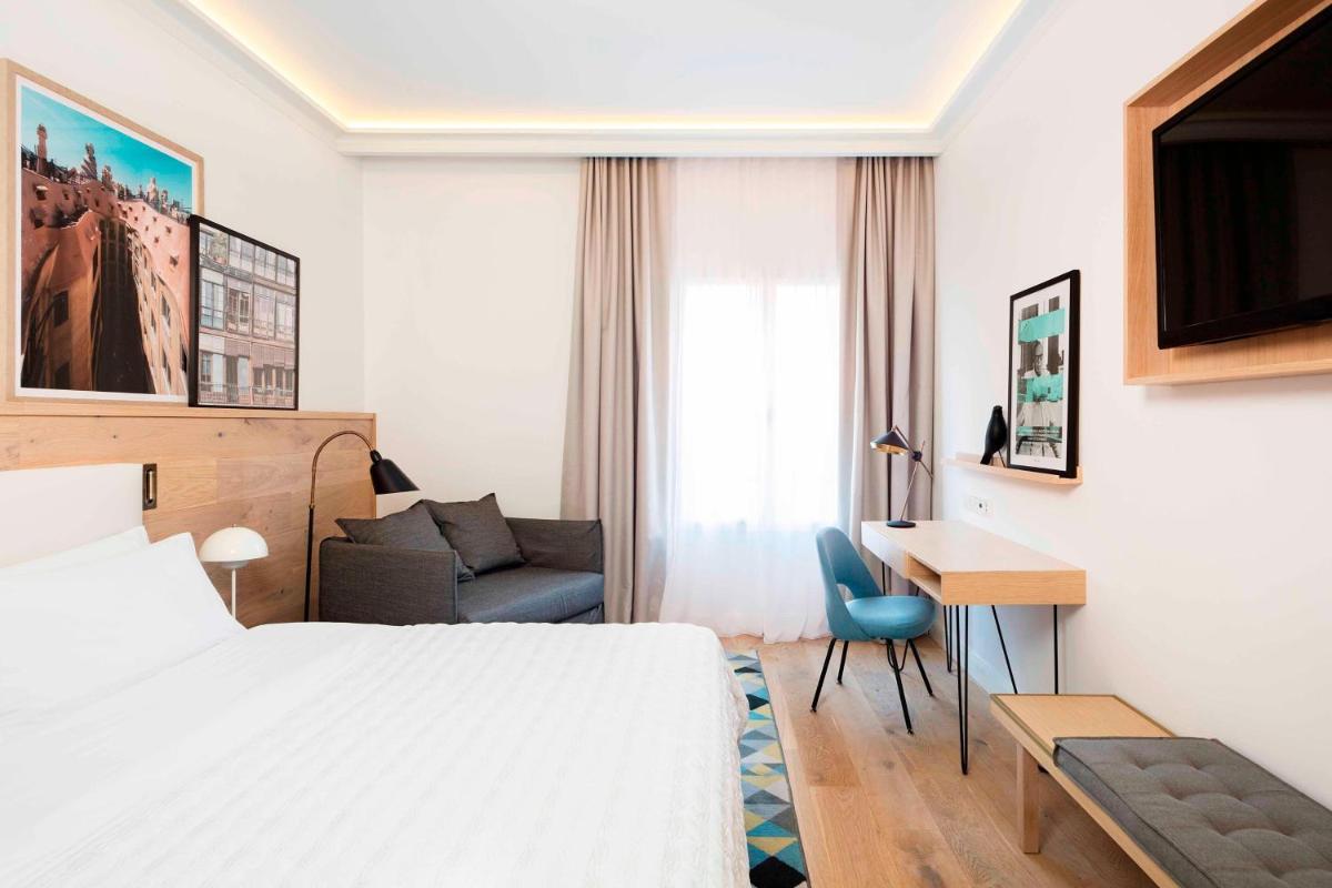 Cama o camas de una habitación en Le Meridien Barcelona