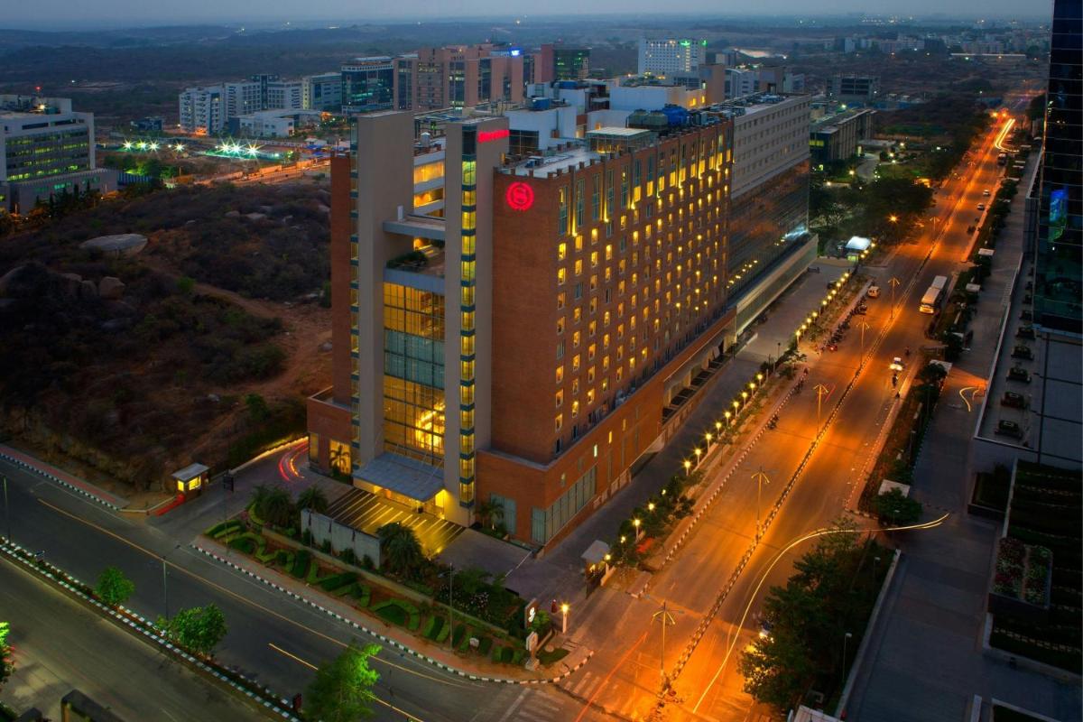 an aerial view of a building with a street at Sheraton Hyderabad Hotel in Hyderabad