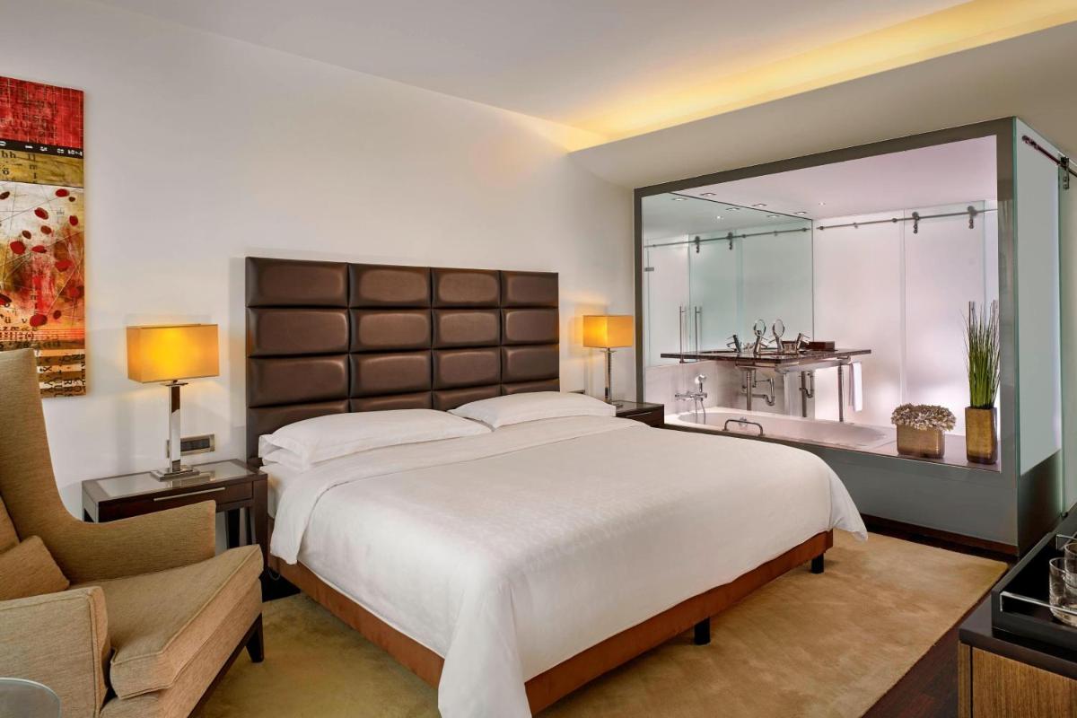 Uma cama ou camas num quarto em Sheraton Porto Hotel & Spa