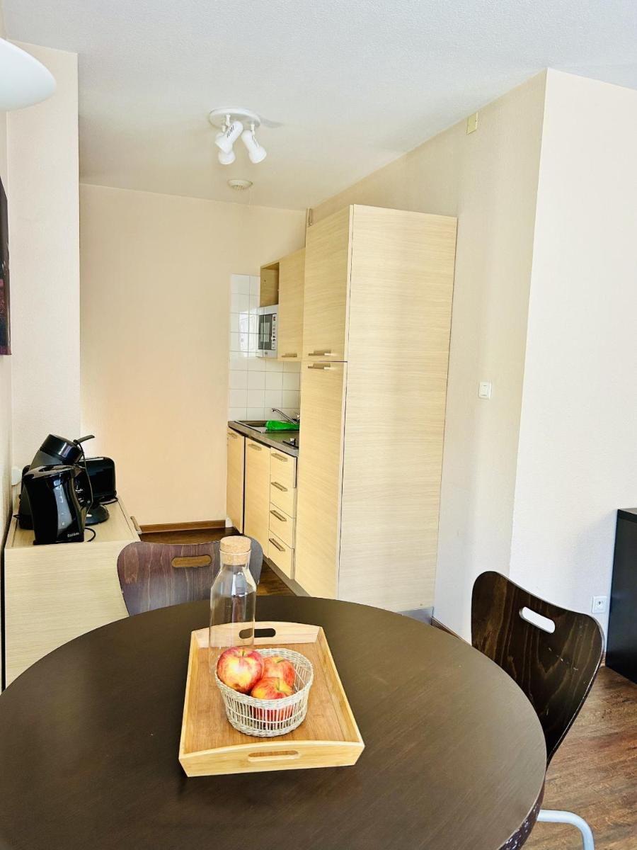 Cuisine ou kitchenette dans l'établissement Résidence Le Grand Tétras- SPA THERMAL INCLUS