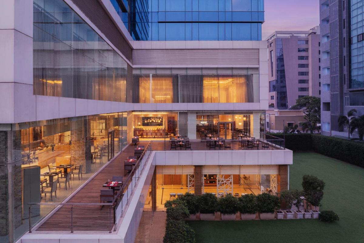 an aerial view of a building with a restaurant at Renaissance Ahmedabad Hotel in Ahmedabad