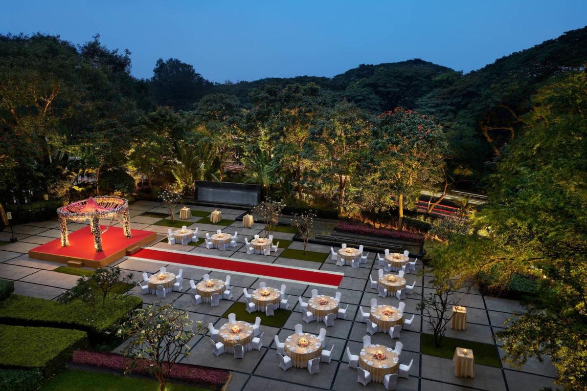 an overhead view of a wedding set up in a garden at JW Marriott Hotel Bengaluru in Bengaluru
