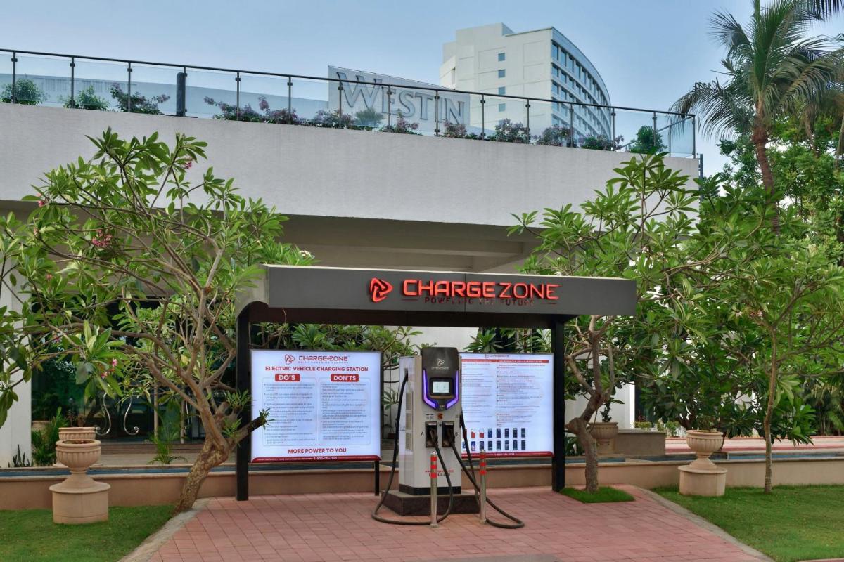 a sign with a camera in front of a change zone at The Westin Mumbai Powai Lake in Mumbai