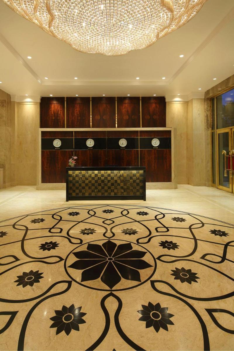 a large room with a large rug on the floor at Sheraton Grand Pune Bund Garden Hotel in Pune