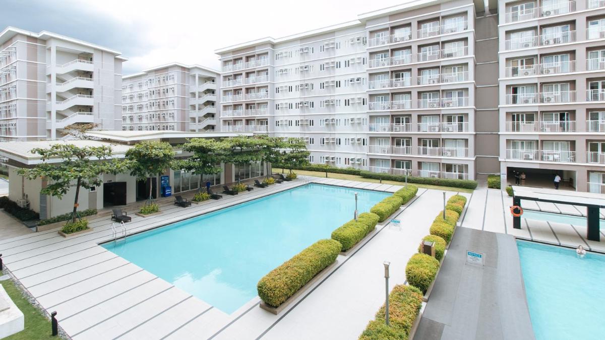 Jamah's Staycation at SMDC Trees Residences by RedDoorz - Housity
